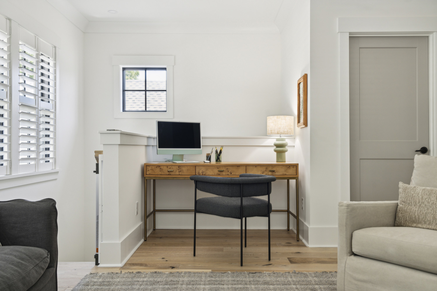 Loft with wooden desk and computer