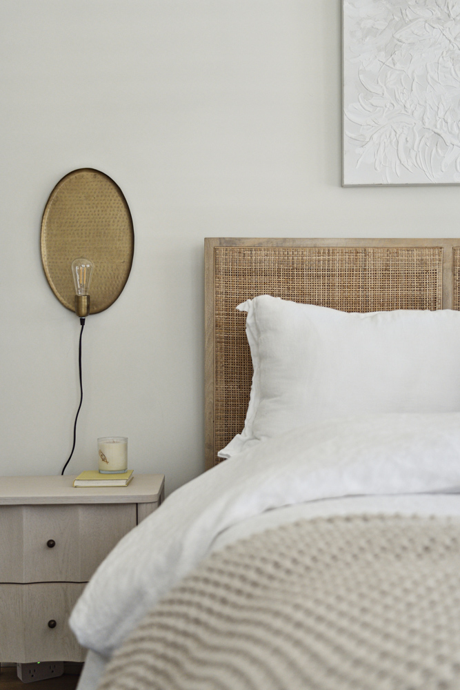 Bedroom furnishings with wall-mounted light